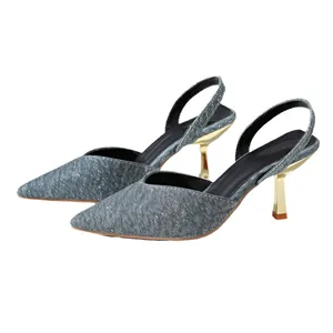 Elegant pointed toe slingback high heels with sparkly fabric and gold stiletto heels.
