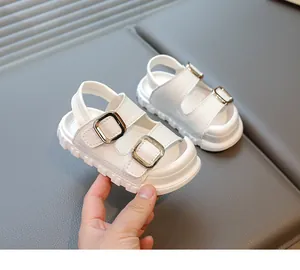 White breathable children's sandals with double buckles for beach and summer wear.