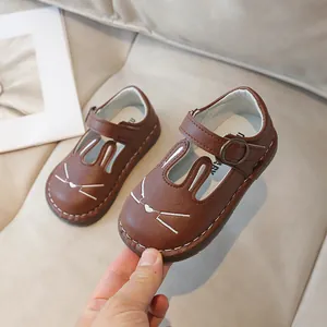 Cute brown girls cartoon leather shoes with bunny ears design and flexible soft soles