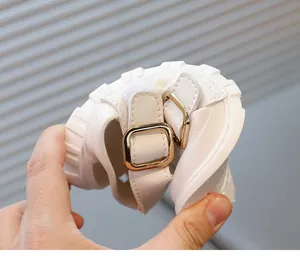 Flexible soft-sole white toddler sandals demonstrating high material durability and comfort.