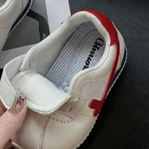 Breathable baby sneakers with soft soles and adjustable hook-and-loop closure straps