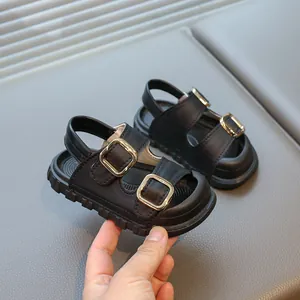Trendy black Korean style children's sandals with gold buckles and breathable open-toe design