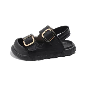 Classic black children's leather sandals with dual gold buckles and open-toe design