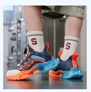 Baskets de sport pour garçons avec semelles dégradées et système de laçage rotatif