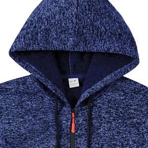 Detailed macro view of the hood, zipper, and neck label on a blue heathered cationic hoodie