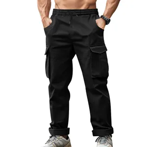 Close-up of men's black tactical cargo pants showing pocket details and drawstring waist