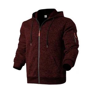 Detailed view of men's heavy fleece zip hoodie featuring textured cationic fabric and sleeve pocket.