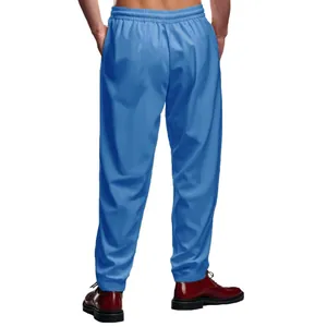 Vista trasera de los pantalones de chándal azules oversize para hombre con cintura.
