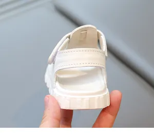 Back view showing the comfortable heel and soft sole of white toddler summer sandals