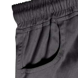 Close-up detail of men's tactical cargo pants featuring elastic waistband and pocket