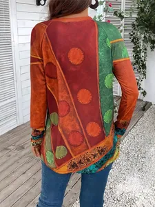 Stijlvolle dames top met lange mouwen in etnische stijl met geometrische kleurblokken