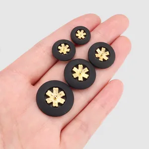 Schwarze Pflanzenfaser-Nylonknöpfe mit goldenem Stern in verschiedenen Größen Set