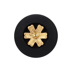 Eleganter schwarzer Nylon-Knopf mit strukturierter goldener Blume für hochwertige Kleidung