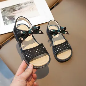 Elegantes sandalias de princesa para niñas con lunares negros, lazo y suela suave