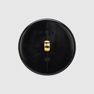 Premium black nylon shank button with gold metal loop for high-end fashion designs