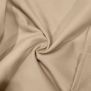 Close-up macro shot of durable khaki twill fabric texture on men's casual cargo pants