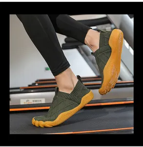Lightweight barefoot running shoes with wide toe box and breathable knit shown on a treadmill