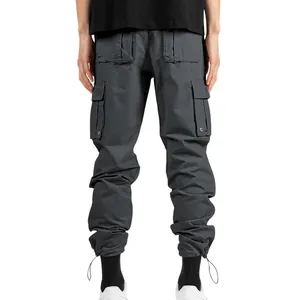 Back view of men's dark grey cargo pants with multiple pockets and drawstring cuffs