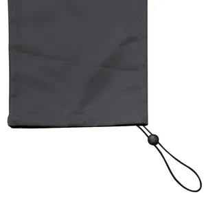 Detailed view of the adjustable drawstring hem with toggle on charcoal gray cargo pants