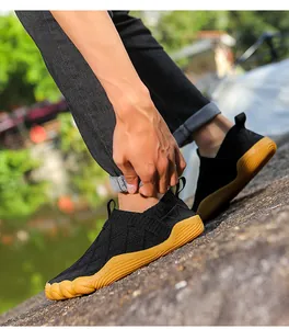 Close-up detail of lightweight wide toe box flyknit barefoot shoes for outdoor hiking