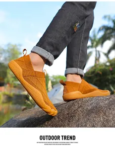 Side view of lightweight men's wide-toe flyknit hiking shoes in outdoor setting.