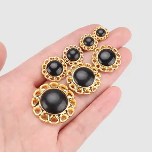 High-end black and gold buttons with ornate filigree frame in various sizes
