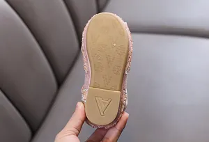 Macro detail of anti-slip rubber sole for toddlers sparkle rhinestone princess shoes