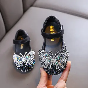 Sparkling black rhinestone princess shoes for little girls with decorative butterfly design