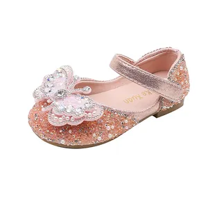 Sparkling rose gold girls princess flat shoes featuring a rhinestone butterfly design