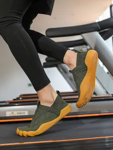 Lightweight barefoot style flyknit sneakers with wide toe and flexible gum sole for jogging