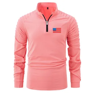 Men's coral long sleeve polo shirt with pleated sleeves and flag detail