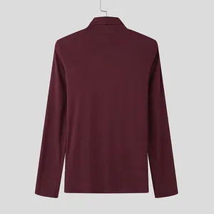 Back view of a men's slim fit wine red turtleneck long sleeve t-shirt in ribbed knit