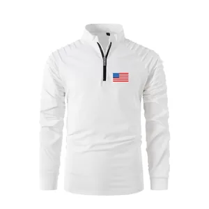 Detailed view of white long-sleeve polo shirt with American flag and pleated sleeves