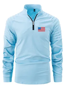 Light blue men's long sleeve polo shirt with unique pleated sleeves and USA flag patch