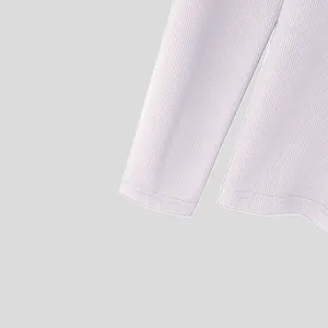 Macro view of light purple men's slim fit ribbed knit long sleeve t-shirt fabric