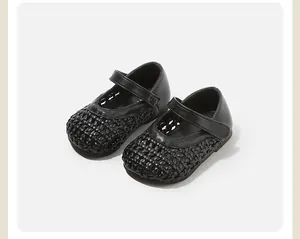 Detailed view of black woven hollow princess shoes for toddlers and little girls.