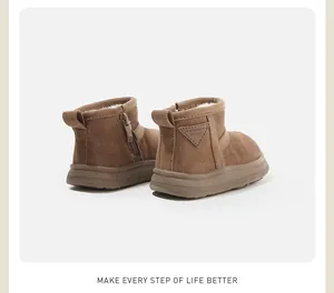 Rear view of brown toddler snow boots showing side zipper and warm fuzzy lining