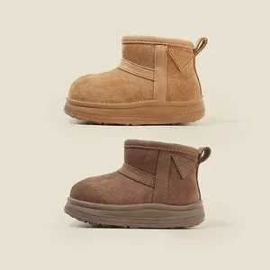 Warm fleece-lined winter snow boots for toddlers in tan and dark brown colors