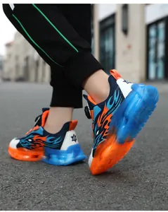Stijlvolle jongens sportschoenen met blauw vlampatroon en draaisluiting voor 2024