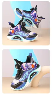 Detailed view of kids' basketball shoes with astronaut graphics and rotating buckle closure.