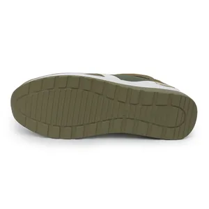 Bottom view showing the olive green anti-slip outsole of the platform sneaker
