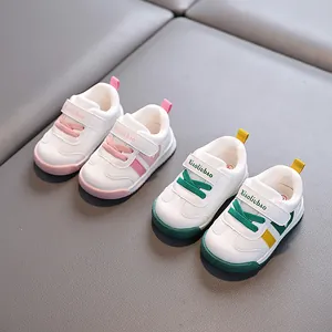 Breathable white toddler sneakers with soft anti-slip soles and velcro straps.