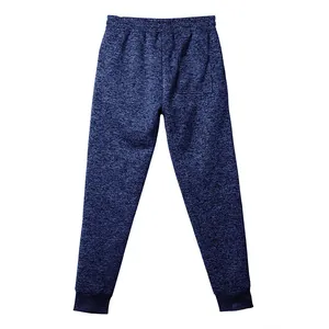 Vista detallada de los pantalones de chándal de forro polar catiónico azul para hombre