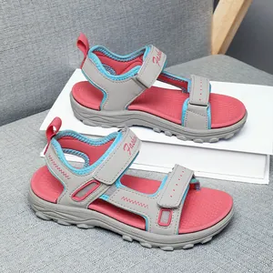 Fashionable grey and pink girls' lightweight beach sandals with secure Velcro straps