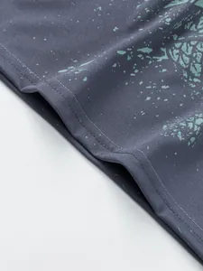 Macro view of double-stitched hem and green splatter print on grey quick-dry tank top