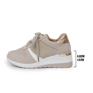 Side profile of women's beige wedge sneaker with 4.0cm heel height measurement