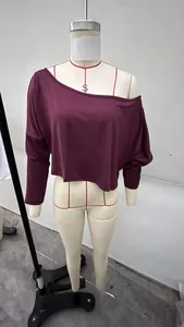 Burgundy off-the-shoulder loose cropped long-sleeve top displayed on a mannequin.