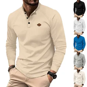 Waffle knit texture detail on men's long-sleeved Henley shirt with button collar