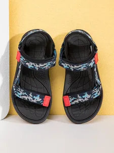 Top view showing camouflage straps and textured sole of these kids' sports sandals.