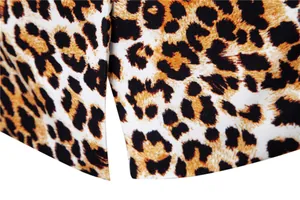 Detailed macro view of leopard print fabric texture and slit on a men's casual suit
